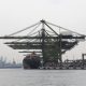 Container ship loading Photo by Manifold Times