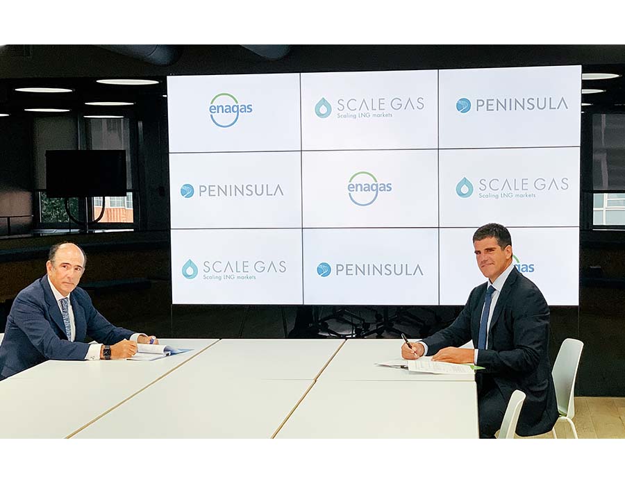 Marcelino Oreja CEO of Enagas and John A. Bassadone CEO of Peninsula at the signing of the agreement