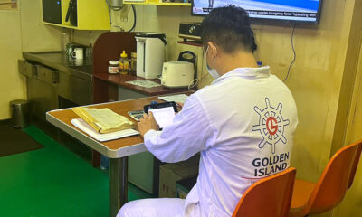 Golden Island crew keying in information