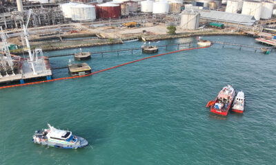 2 MPA craft (left) supporting Shell craft in the clean up operations of the oil sheens taken on 28 Dec 9am
