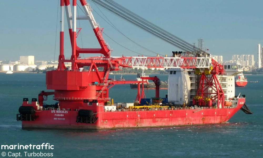 A Panama-flagged crane ship, SFE Hercules, was arrested in Singapore waters on Friday (26 December). The vessel was added to the list of vessels under Sheriff’s arrest in Singapore’s court system. According to the list, the vessel was arrested at 2.35pm and the arresting solicitor listed was law firm Virtus Law LLP. The ship is currently held at Raffles Reserved Anchorage / 4510D. No details were provided in the list regarding the reason behind the arrest. Photo credit: MarineTraffic / Capt. Turboboss Singapore: Panama-flagged crane ship “SFE Hercules” placed under Sheriff’s arrest